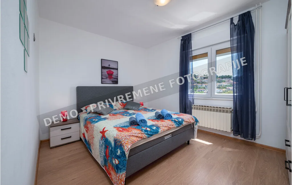 Spavaća soba apartmana Prvi kat u Rapcu — privremena demo fotografija
